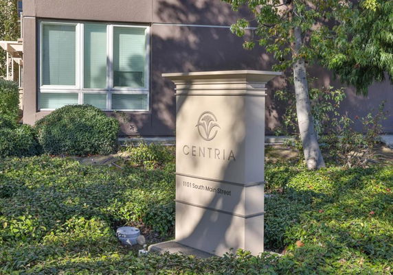 Front view of a building with a sign reading 'CENTRIA' at 1101 South Main Street.