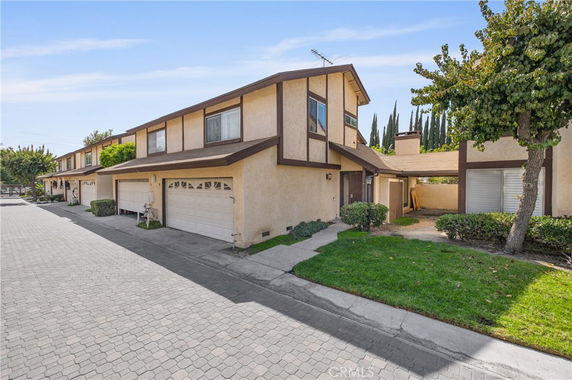 Front view of a two-story house with a double garage.