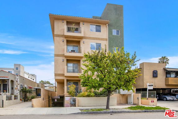 Front view of a multi-story apartment building.