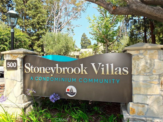 Sign for Stoneybrook Villas condominium community.