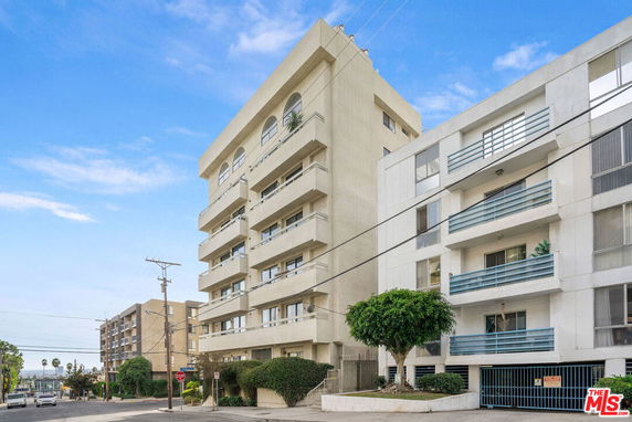 Front view of a multi-story residential building.