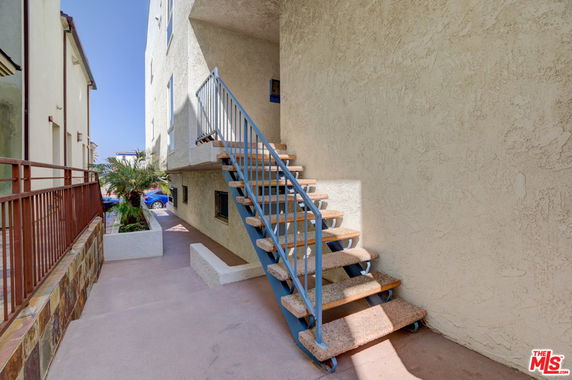 Outdoor staircase leading to upper area of a building