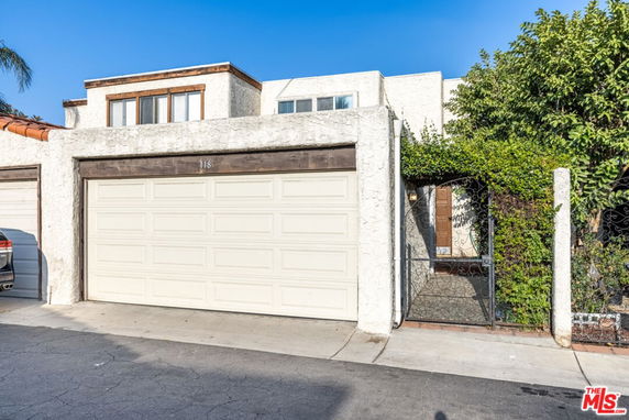 Front view of a house with an attached double garage.