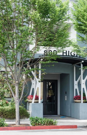 Front view of a building entrance with modern design.