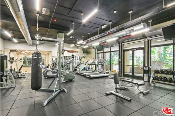 Interior view of a gym with exercise equipment.