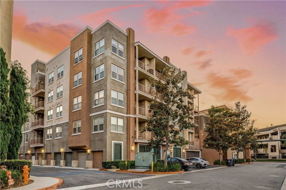 Front view of a multi-story apartment building.
