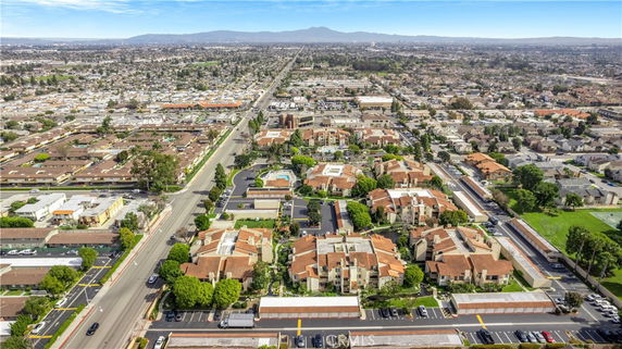 Aerial view of a residential area with multiple apartment buildings and roads.