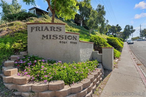 Entrance sign displaying 'Friars Mission' with landscaping