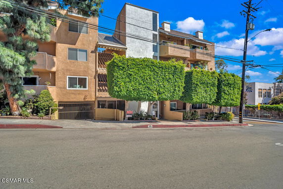 Front view of a multi-story apartment building.