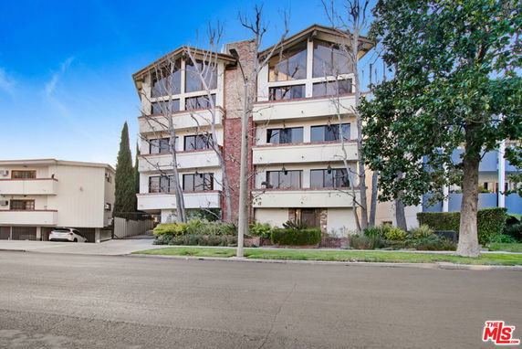 Front view of a multi-story residential building.