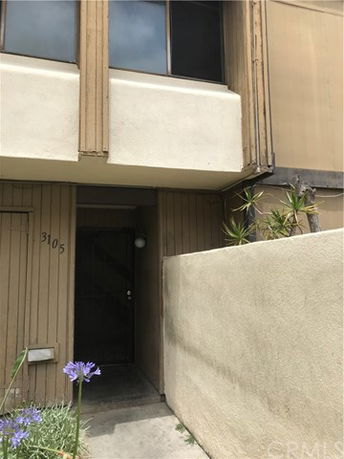Front view of a two-story building with a minimalistic design.