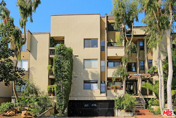 Front view of a multi-story apartment building.