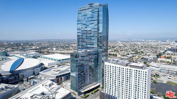 Tall skyscraper with a modern glass facade.