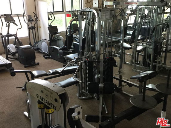 Indoor gym area with exercise equipment