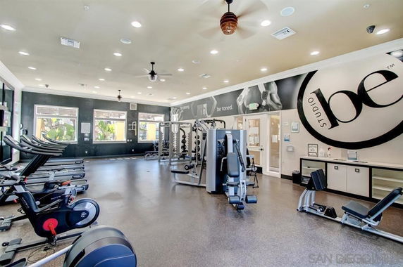 Interior view of a gym with exercise equipment.