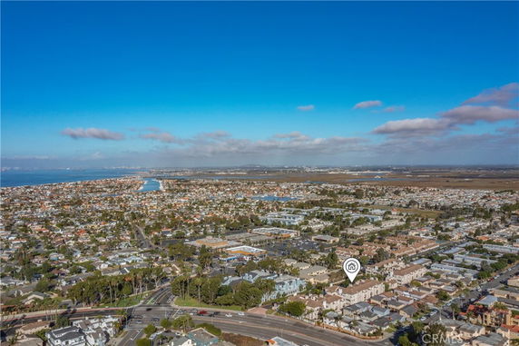 Panoramic view of a residential area with a cityscape in the distance