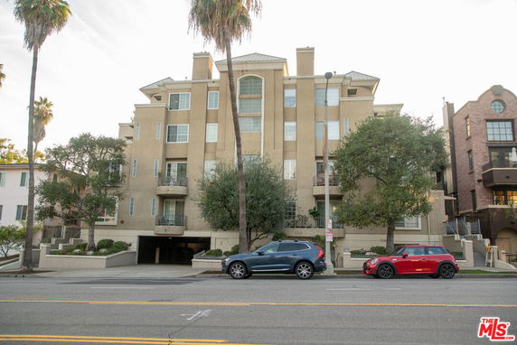 Front view of a multi-story apartment building.