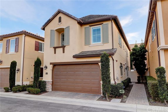 Front view of a two-story house with a double garage.