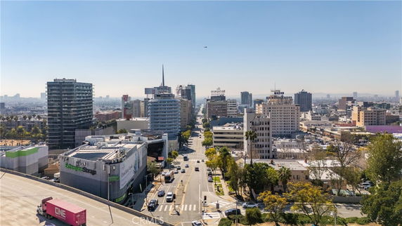 Panoramic view of an urban area with multiple mid-rise and high-rise buildings.