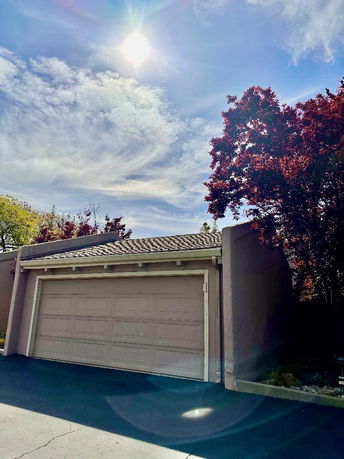 Front view of a building with a double garage.