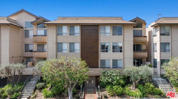 Front view of a multi-story apartment building.