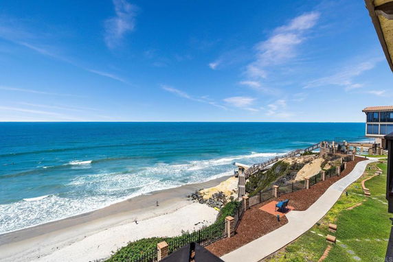 Panoramic view of the ocean and coastline seen from a building.