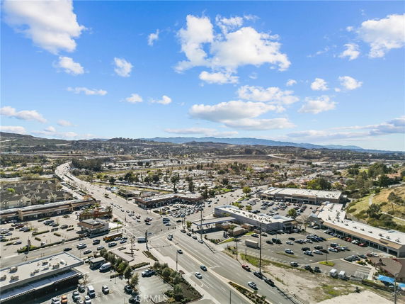 Elevated wide angle view of urban area and surrounding landscape