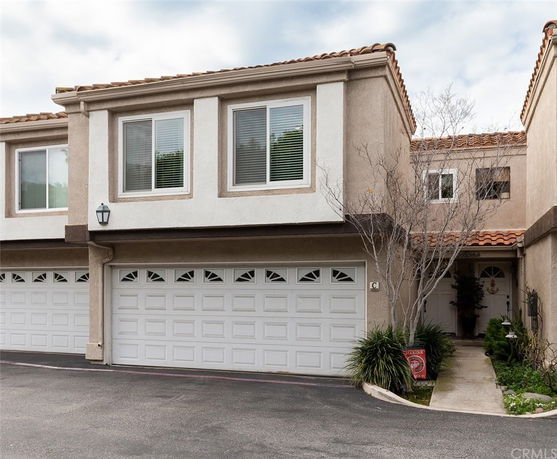Front view of a house with a double garage.