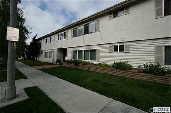 Front view of a two-story apartment building.