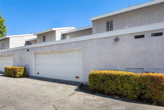 Front view of a building with a double garage.