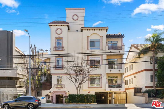 Front view of a multi-story residential building.