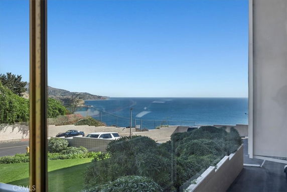 Panoramic view of the ocean and coastline from a building.