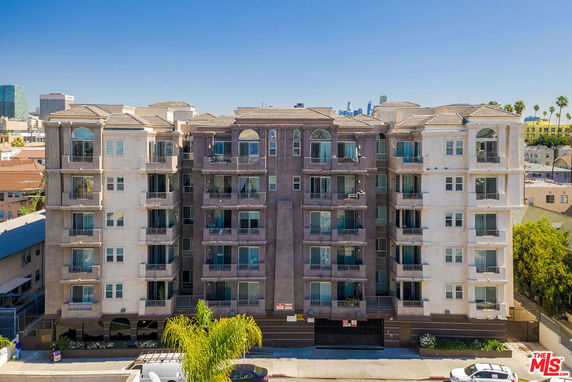 Front view of a multi-story residential building.