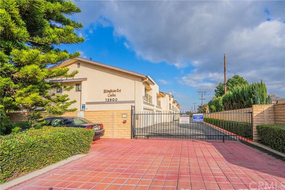Front view of a gated residential building complex