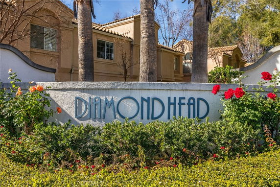 Front view of a residential building with a sign reading 'Diamond Head'.