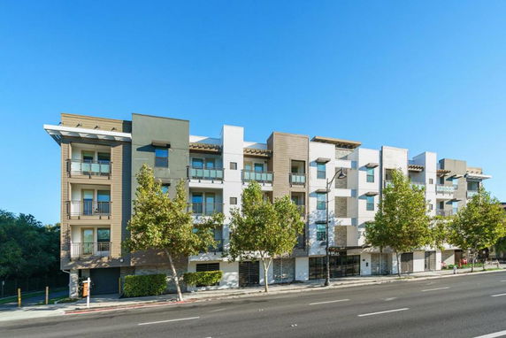 Front view of a multi-story residential building.