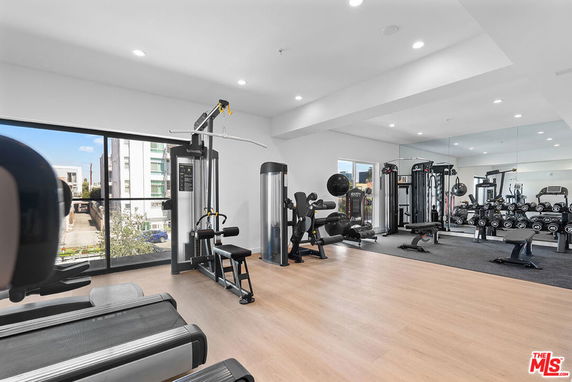 Interior view of a gym with exercise equipment.