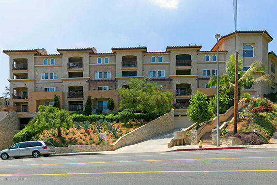 Front view of a multi-story residential building.