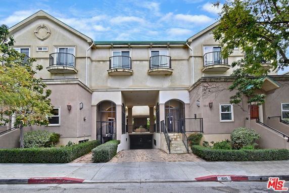 Front view of a multi-story residential building.
