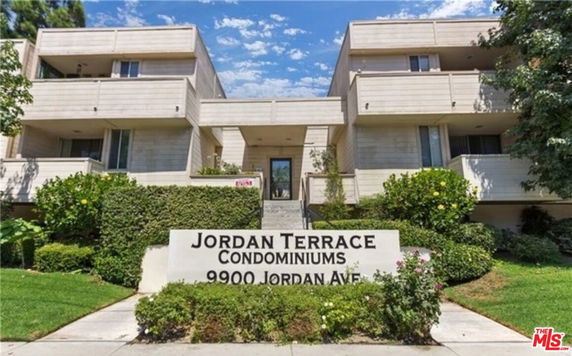 Front view of a multi-story condominium building named Jordan Terrace.