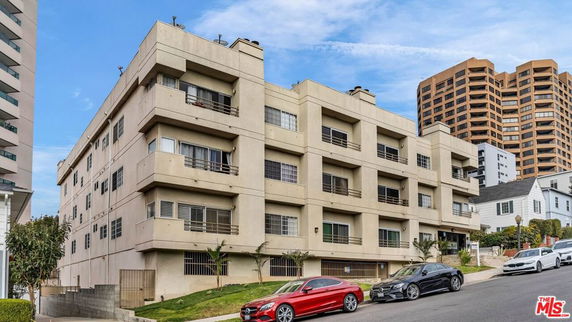 Front view of a multi-story residential building.