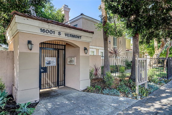 Front view of a gated entrance to a property.