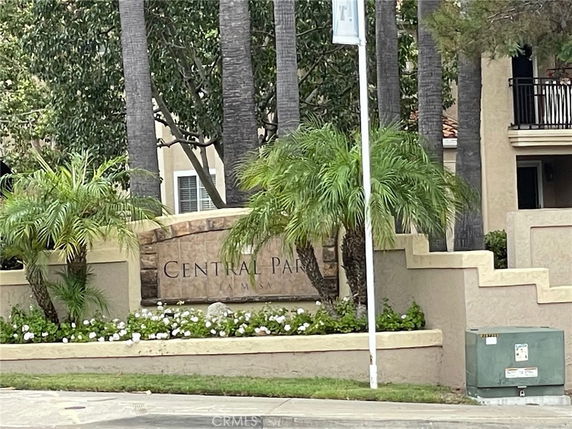 Front view of a building entrance with a sign saying 'Central Park'.