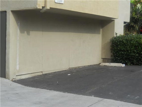 Outdoor parking space beside a building