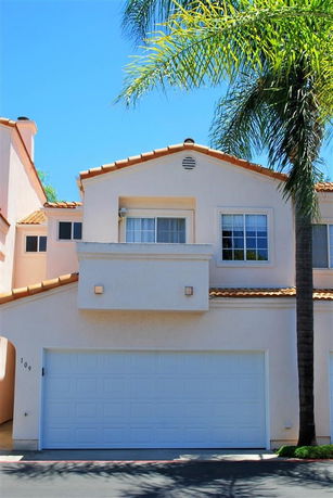 Front view of a house with a double garage.