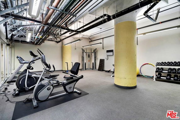 Gym area with exercise equipment and weights