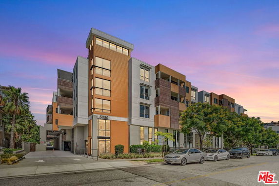 Front view of a multi-story modern apartment building