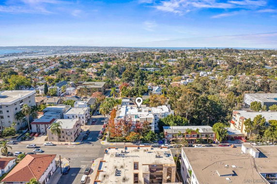 Panoramic view of a cityscape with buildings and greenery