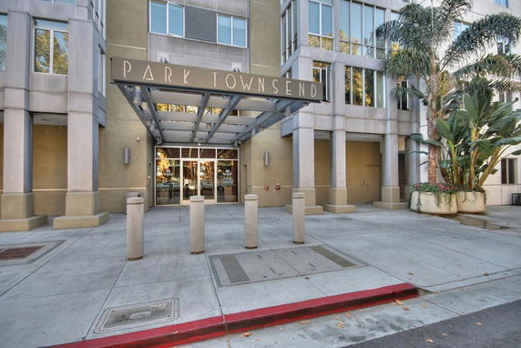 Front view of a building with large entrance and signage saying 'Park Townsend'.
