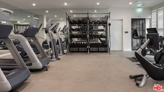 Interior view of a gym with exercise equipment.